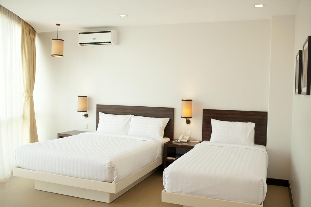 D'Hotel y Suites Dipólog Habitación foto